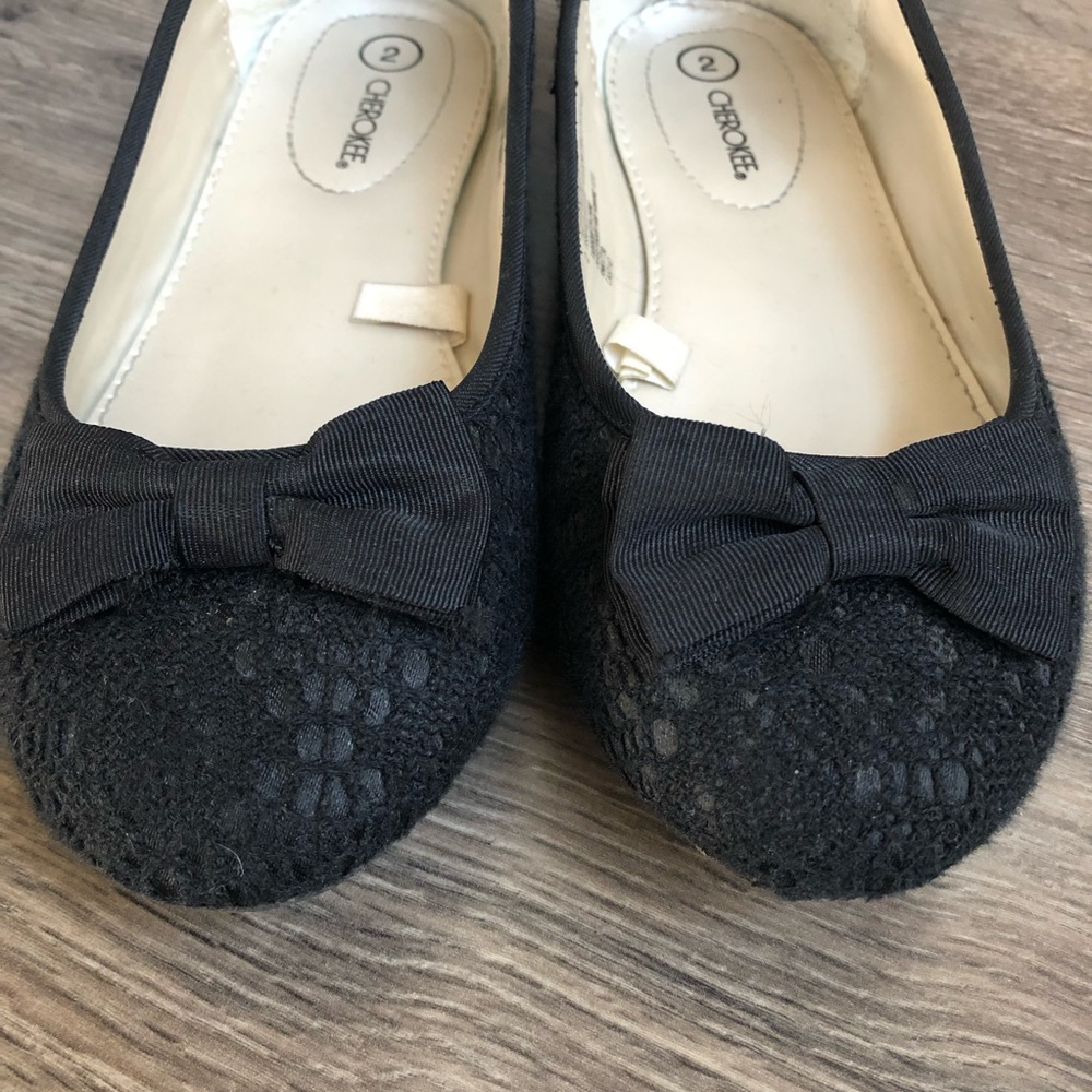 Black flats.